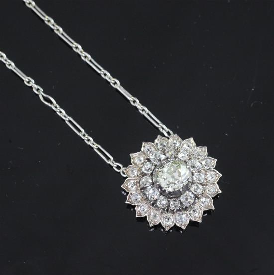 A Victorian gold, silver and diamond cluster sunburst pendant, pendant 1in.
